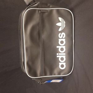 Adidas Airliner, crossbody messenger bag. Black with white trim and logo